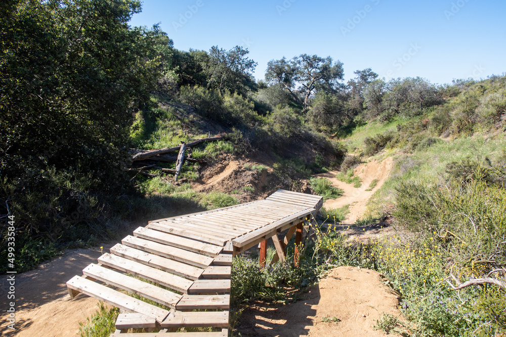 A Back Woods Hiking and Biking Trail in the California Hills with Jumps Built by Local Kids 