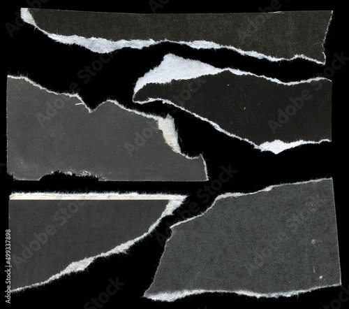 black paper with torn edge texture photo