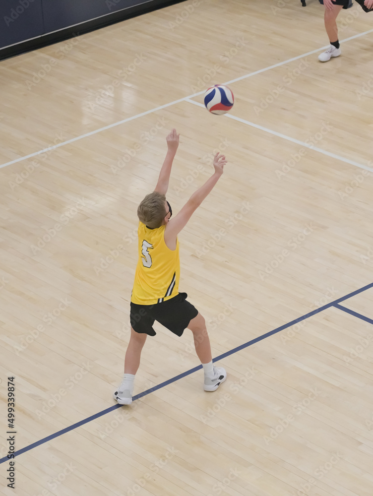 Volleyball player doing an overhand pass