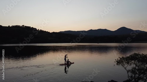 Paddle boarding, lake district, 4K lake, drone footage. This is a video of paddle boarding on lakes in the lake district England. 4K video footage. 