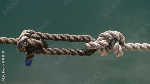 knotty rope on a gray green background