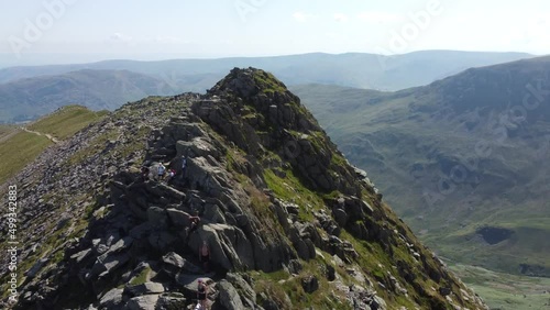 Striding Edge, Lake District, Uk mountain. UK drone footage. Striding edge tarn. Tarn and UK mountains. 4K drone footage of hills. UK countryside. 