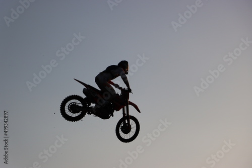 Silhouette of motocross rider