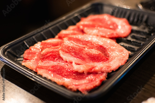 Raw beef or meat in plastic plate preparing for grilled yakiniku style.