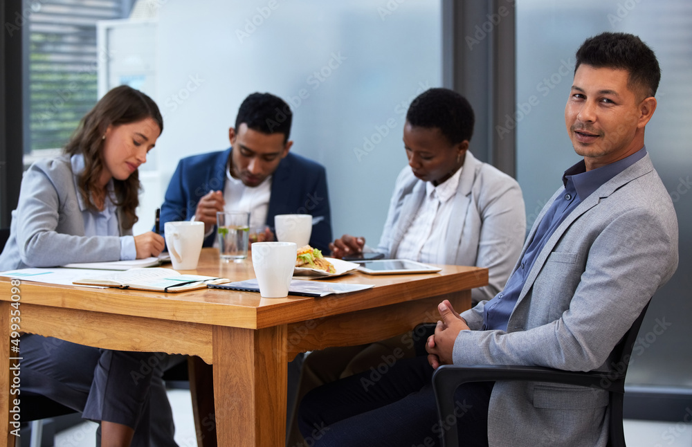 Its important that team members hear out one anothers opinions. Shot of a group of colleagues having a meeting and breakfast in a modern office. Its important that team members hear out one anothers opinions. Shot of a group of colleagues having a meeting and breakfast in a modern office.