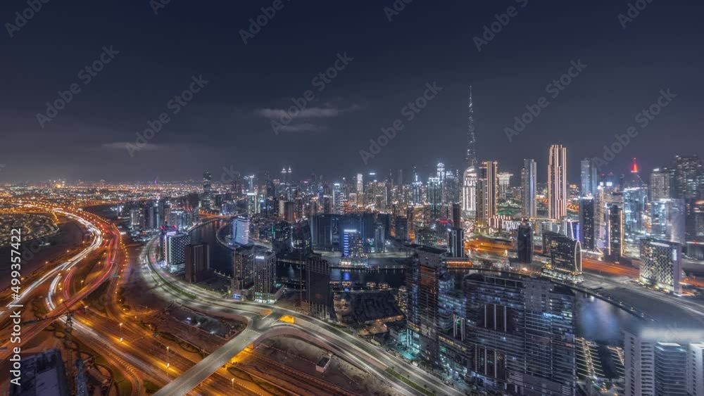 Panoramic skyline of Dubai with business bay and downtown district night timelapse. Panoramic skyline of Dubai with business bay and downtown district night timelapse.