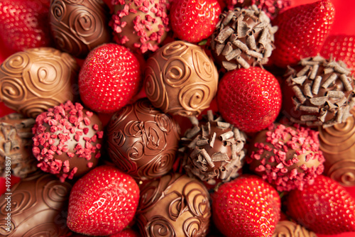 Delicious seductive strawberries in chocolate close-up as background or backdrop
