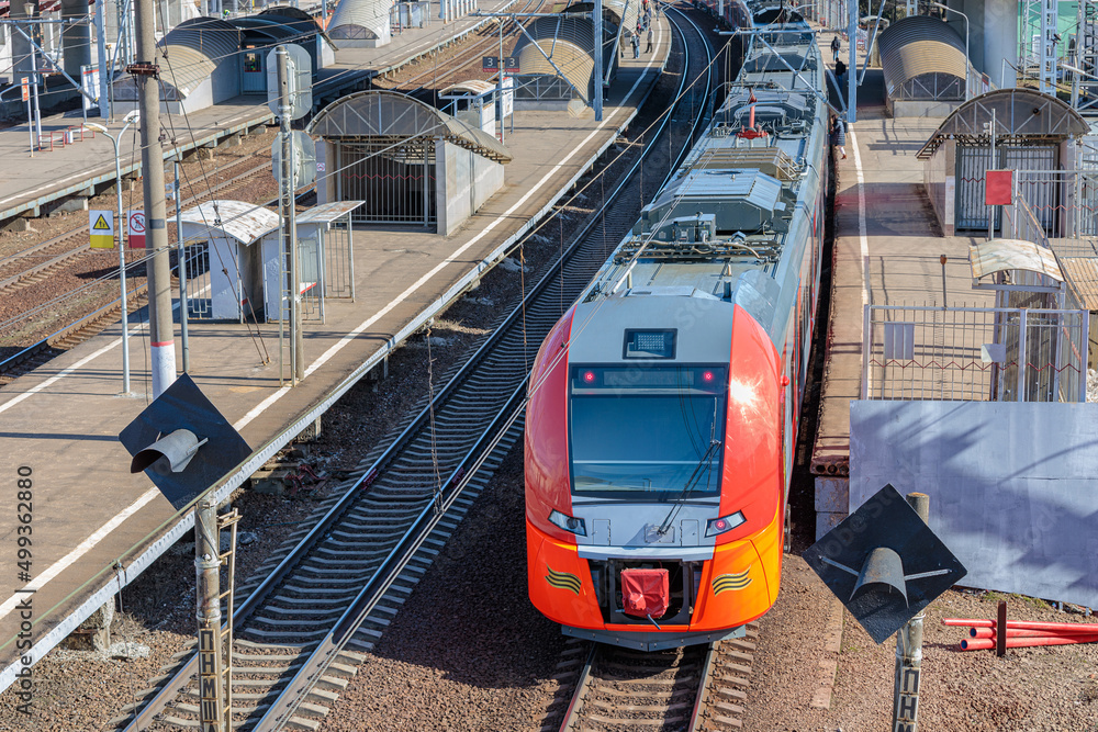 Naklejka premium A modern high-speed train stands at the station.
