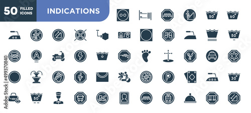 set of 50 filled indications icons. editable glyph icons collection such as dry medium heat, shield, shock, no arms, p inside a circle, scholar bus stop, swings vector illustration.