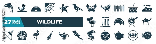 set of wildlife icons in filled style. glyph web icons such as dolphin, cobweb, crab, picnic basket, relics, dromedary, flamingo, toucan editable vector.