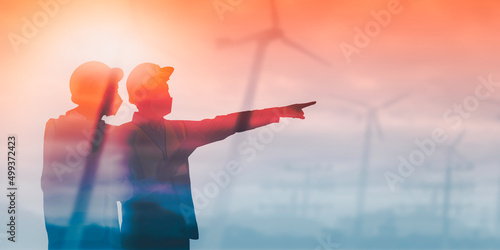 Portrait group industrial safety worker in medical face mask and safety suite arm cross in factory