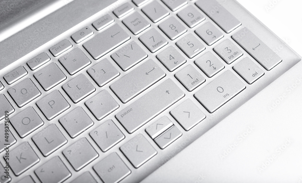 Grey laptop keyboard for entering information, data in computer. High quality photo Grey laptop keyboard for entering information, data in computer. High quality photo