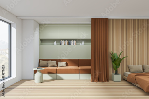 Light bedroom interior with bed and couch with shelf  panoramic window