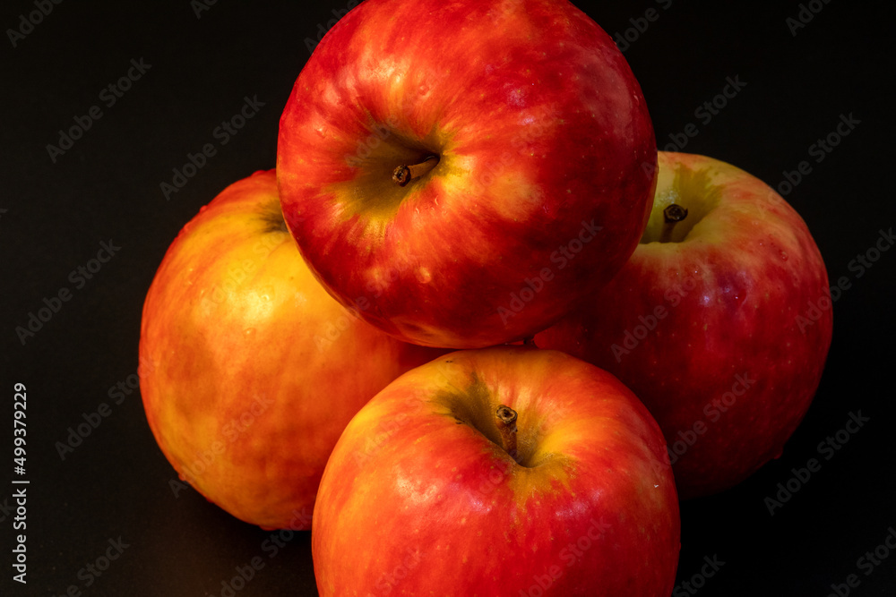 Apple pink lady isolated in black background - using studio lights