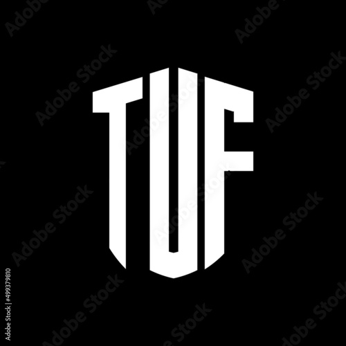 TUF letter logo design. TUF modern letter logo with black background. TUF creative  letter logo. simple and modern letter logo. vector logo modern alphabet font overlap style. Initial letters TUF  photo