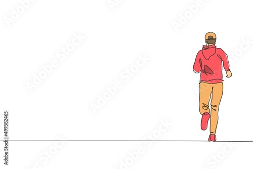 One single line drawing young energetic man runner run relax in street city road vector graphic illustration. Healthy sport training concept. Modern continuous line draw design for running race banner