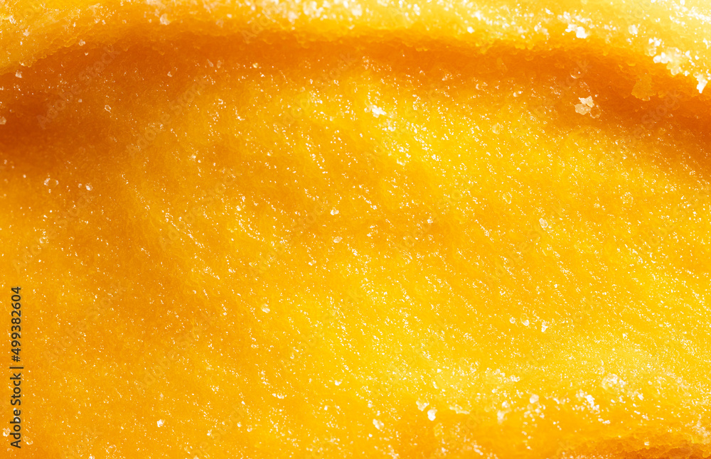 Dried yellow mango pulp as background. Stock Photo Adobe Stock