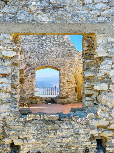 Obraz na plátne Recursion view through the window in stone wall