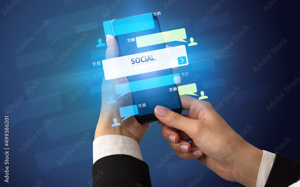 Hand using smartphone with social media concept Hand using smartphone with social media concept
