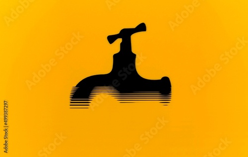 creative pattern and artistic design of a water tap black on gold