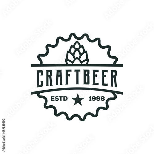 Badge shaped beer bottle cap with hops CRAFT BEER text and asterisk vector illustration. line art