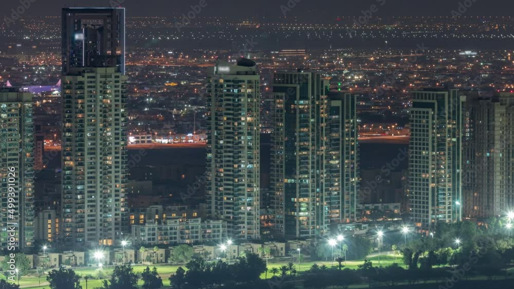 Aerial view of greens district area night timelapse from Dubai marina. Aerial view of greens district area night timelapse from Dubai marina.