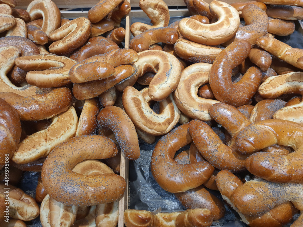 Freshly baked traditional loupak or makovka - Czech sweet roll croissant with poppy seeds in bakery or grocery store displayed on shelf. Sweet pastry in Czech republic, Europe. Closeup Freshly baked traditional loupak or makovka - Czech sweet roll croissant with poppy seeds in bakery or grocery store displayed on shelf. Sweet pastry in Czech republic, Europe. Closeup
