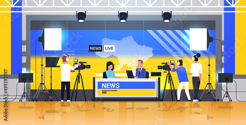 pray for Ukraine peace save Ukraine from russia stop war presenters interviewing woman in television studio tv live news