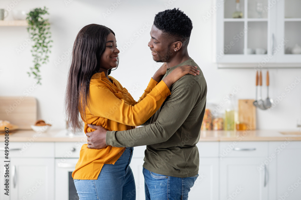 Portrait Of Young Loving Black Couple Having Romantic Moments At Home