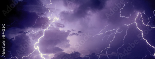 Fork lightning striking down during summer storm   © Solid photos