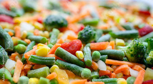 Frozen vegetable mixture of carrots, corn, peas, legume, broccoli, pepper