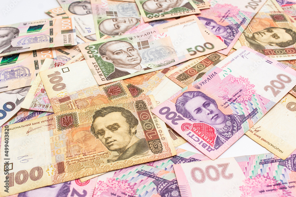 New banknotes with a face value of hryvnia. Money background. Ukrainian money. Business concept. New banknotes with a face value of hryvnia. Money background. Ukrainian money. Business concept.