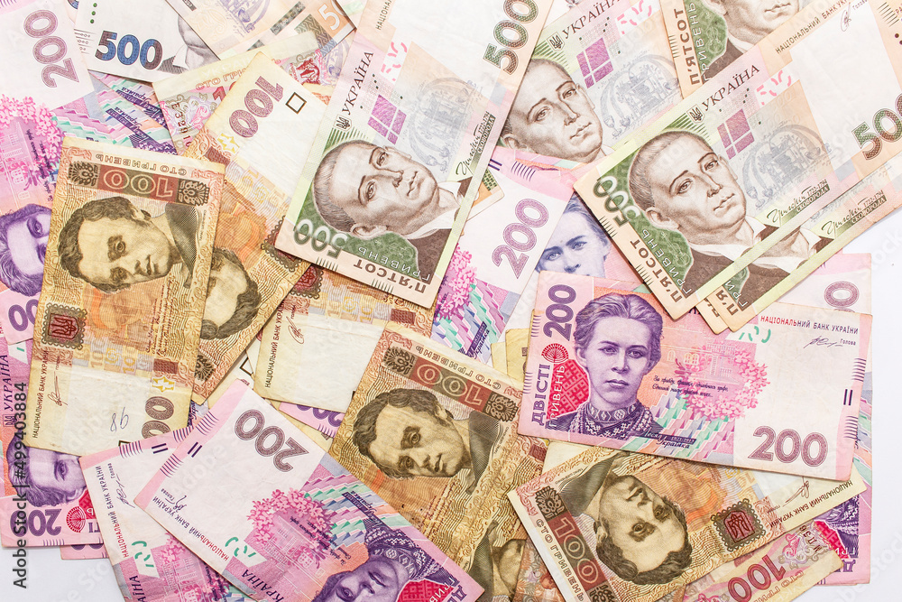 New banknotes with a face value of hryvnia. Money background. Ukrainian money. Business concept. New banknotes with a face value of hryvnia. Money background. Ukrainian money. Business concept.