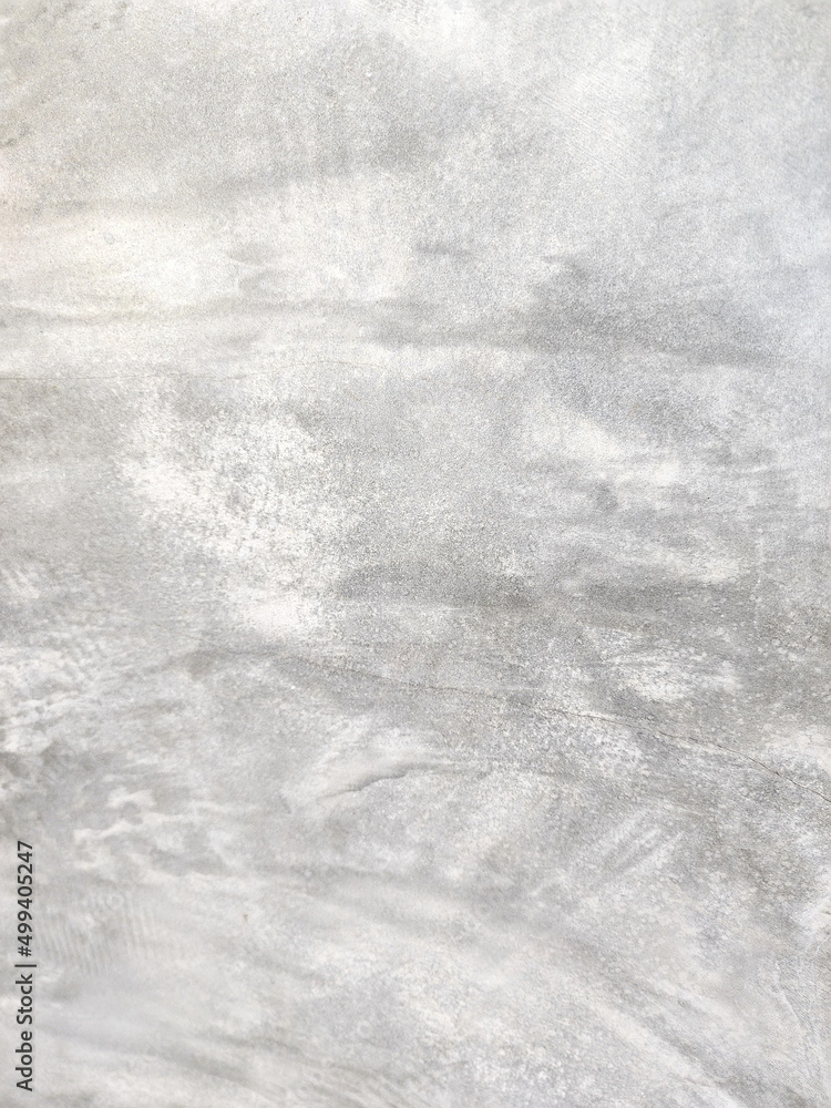 Naklejka premium Vertical image of gray concrete wall with uneven color Concrete floor for antique cement wall background Copy space for text 