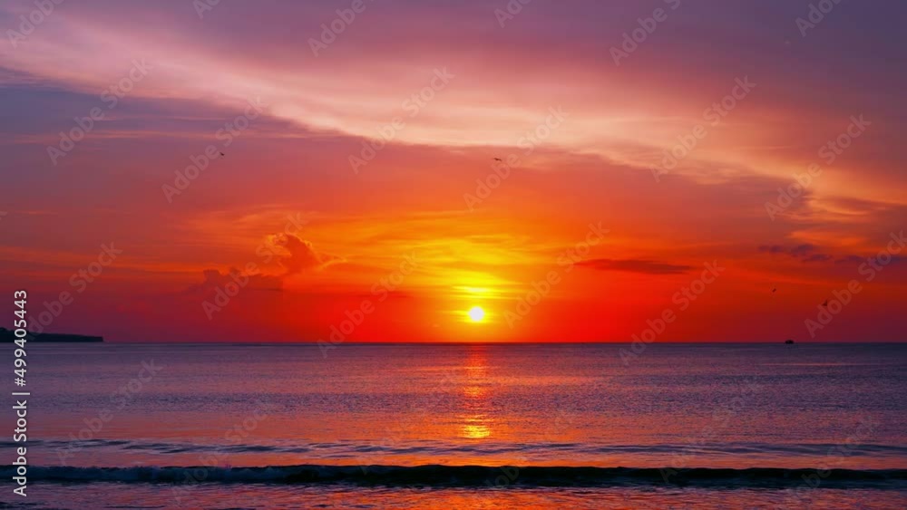 Tropical beach with ocean and scenery clouds on nature background at sunset 4K Tropical beach with ocean and scenery clouds on nature background at sunset 4K