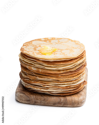 Stack of thin pancakes isolated on white