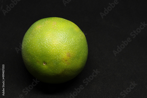 closeup shot sweet lime(citrus fruit) mosambi. with background photo
