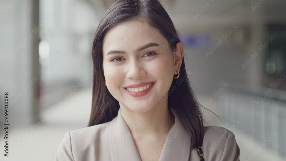 A portrait of beautiful smiling Businesswoman in modern City , people lifestyle concept A portrait of beautiful smiling Businesswoman in modern City , people lifestyle concept