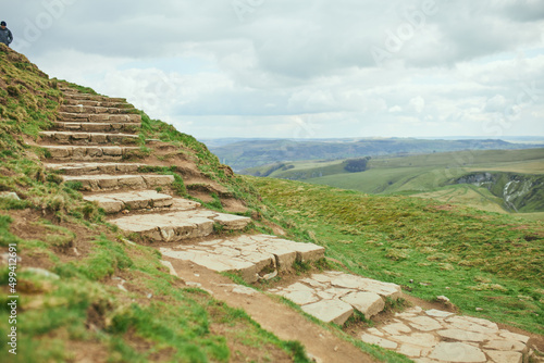 The Peak District National Park, a stone staircase through the green hills leading to the sky. England