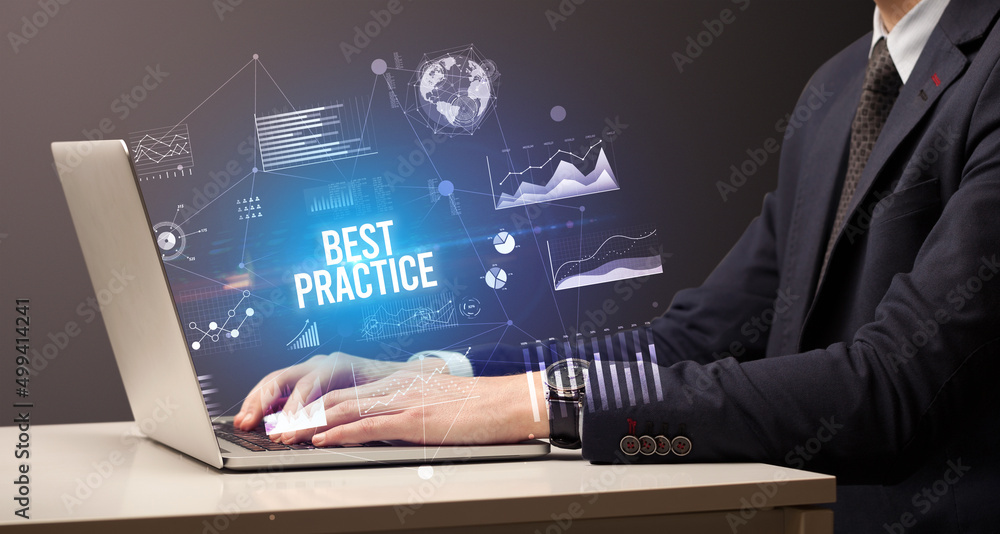 Businessman working on laptop, business concept