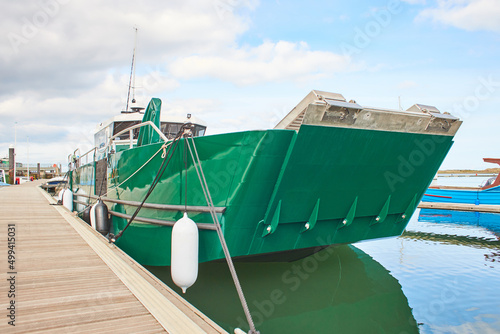 Big cargo comertial boat in harbour. photo