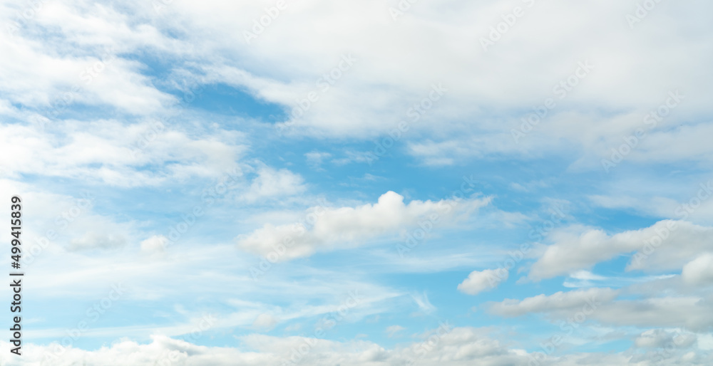 White fluffy clouds on blue sky. Soft touch feeling like cotton. White puffy cloudscape. Beauty in nature. Close-up white clouds texture background. Sky on sunny day. Summer sky with fresh air. White fluffy clouds on blue sky. Soft touch feeling like cotton. White puffy cloudscape. Beauty in nature. Close-up white clouds texture background. Sky on sunny day. Summer sky with fresh air.