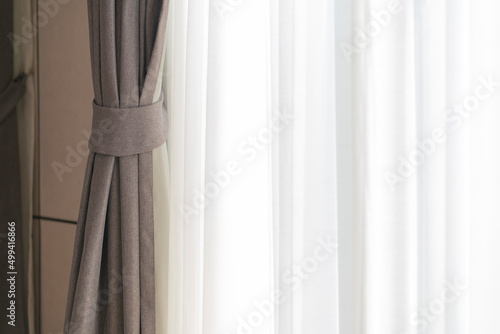 soft brown curtain with morning light from window bedroom background banner header size image