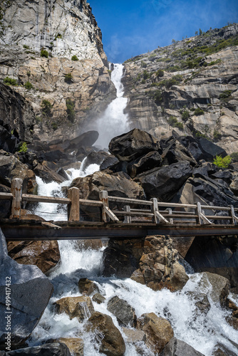 Wapama Falls flows under a bridge, into the Hetch Hetchy Reservoir, in Yosemite National Park, near Merced, California. photo