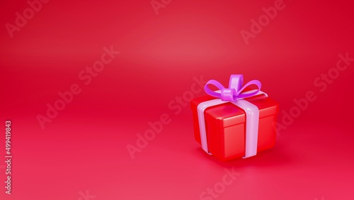 red gift box with ribbon on red background