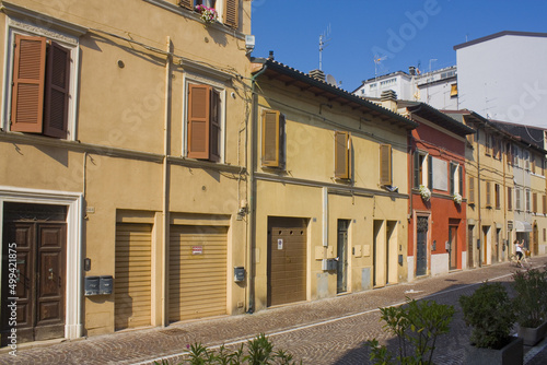 Street with historical old buildings in downtown of Pesaro