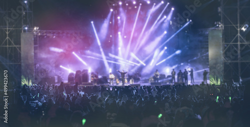 Wallpaper Mural Silhouettes of people in Summer festival concert.Light from the stage. Torontodigital.ca