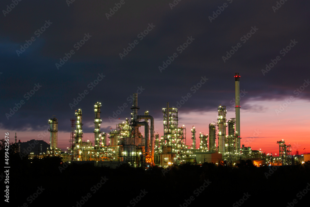 Oil​ refinery​ and​ plant and tower column of petrochemistry industry in pipeline oil​ and​ gas​ ​industry with​ sun red sky the morning