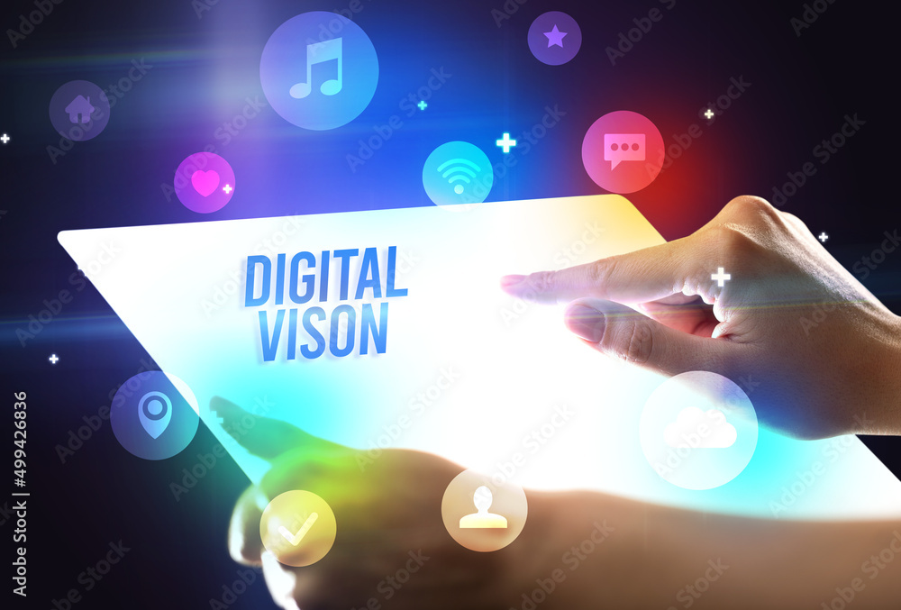 Holding futuristic tablet, new media concept Holding futuristic tablet, new media concept
