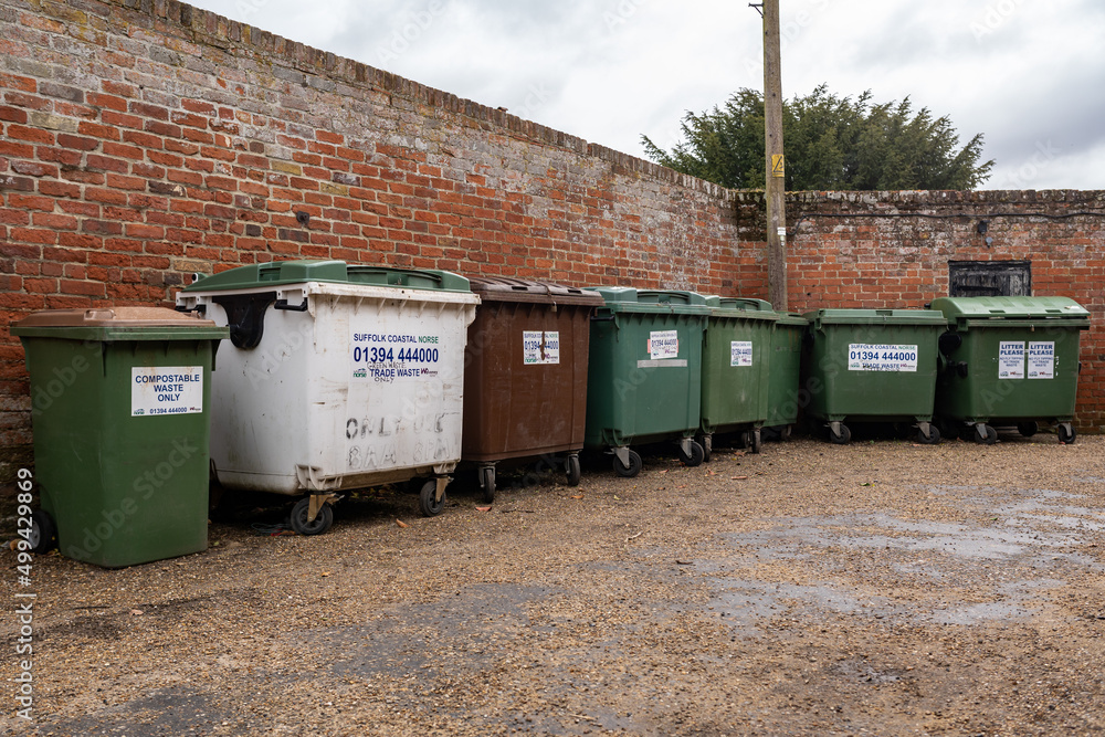 Woodbridge Suffolk UK April 05 2022 A row of wheelie bins waiting for